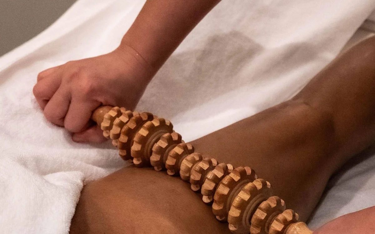 A wood therapy massage in progress